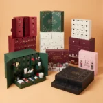 custom advent calendar cardboard boxes with numbered perforated doors and full color seasonal print